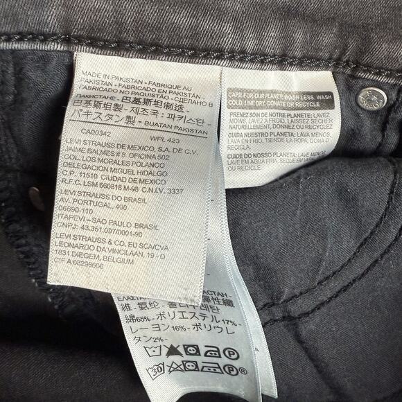 Levi's Jeans Women's 27 Black Denim Stretch Mid-Rise Slimming Skinny Leg Zip Fly - Picture 15 of 16